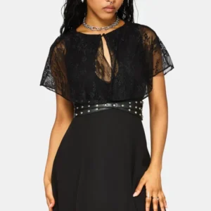 A woman modeling a black lace and chiffon mini dress with a studded waist belt, against a light gray background.