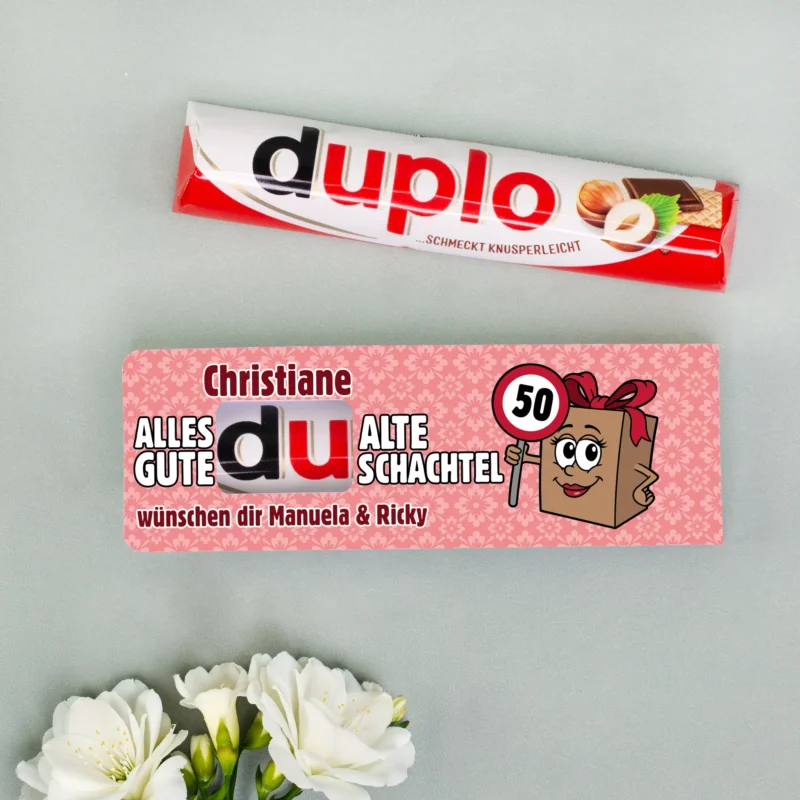 Original duplo Riegel neben personalisierter Alte Schachtel Banderole mit Name Christiane und Alter 50